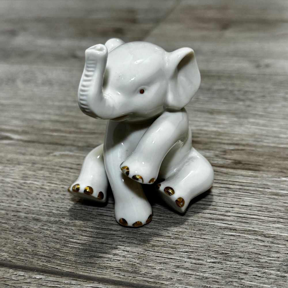 Lenox Ivory Porcelain Sitting Elephant Figurine Gold Accents Raised Trunk 2.75"